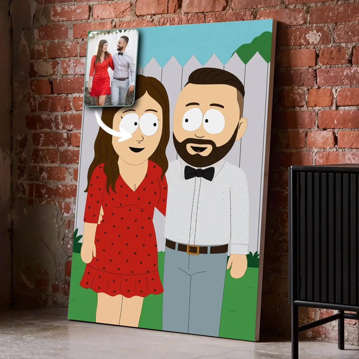 Portrait personnalisé style South Park sur toile, posé au sol contre un mur de briques rouges