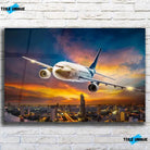 Tableau Décoratif avion de nuit en verre acrylique, vue de face sur un mur de briques blanches