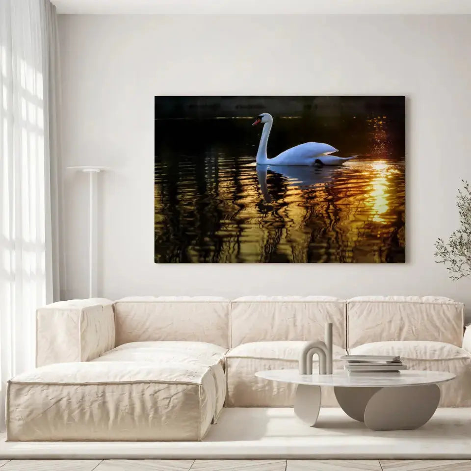 Tableau Décoratif Cygne sur toile, accrochée dans un salon lumineux au-dessus d'un canapé beige