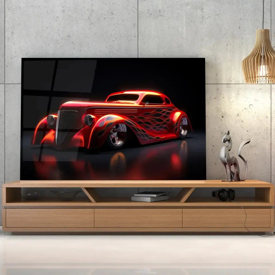 Tableau Décoratif Hot Road Flammes en verre acrylique, posé sur un meuble TV en bois devant un mur en béton