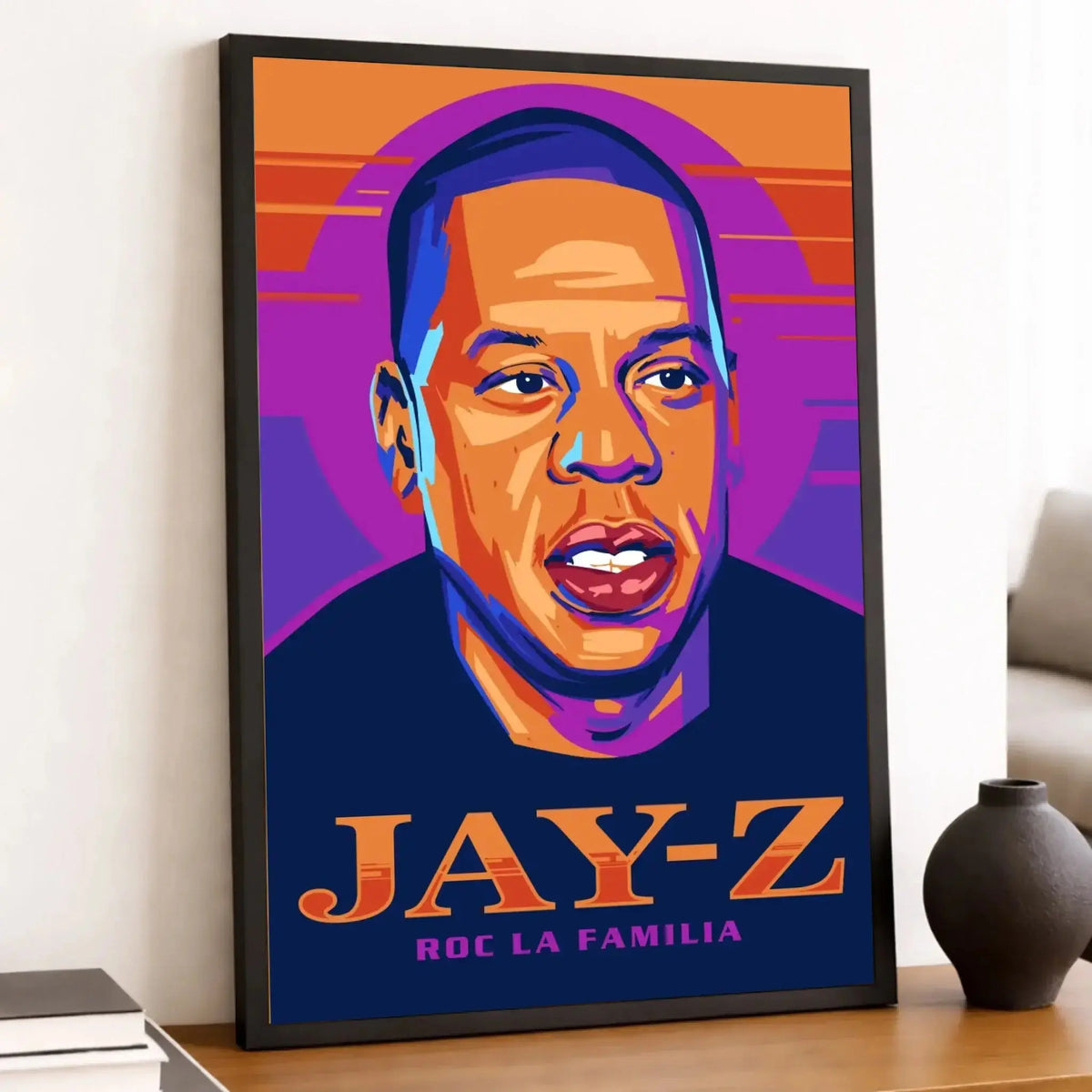 Tableau Décoratif Jay-Z en affiche encadrée noire sur une étagère