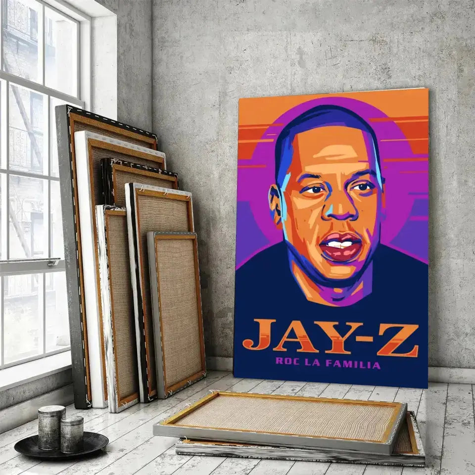 Tableau Décoratif Jay-Z sur toile, posé devant des cadres empilés près d'une fenêtre