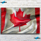 Tableau Drapeau Canada sur toile, vue de face sur un mur de briques blanches