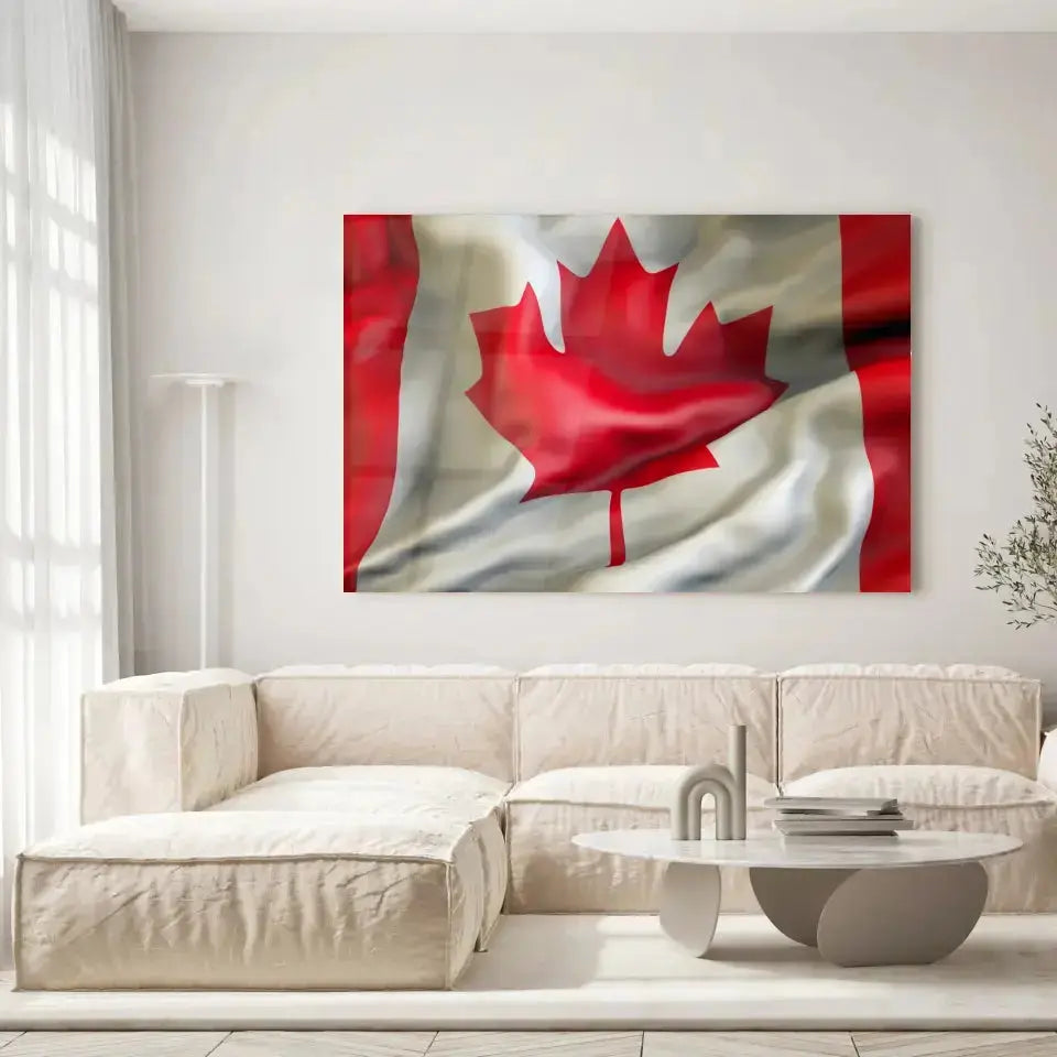 Tableau Drapeau Canada en verre acrylique, accroché dans un salon lumineux au-dessus d'un canapé beige
