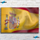 Tableau Drapeau Espagne en verre acrylique, vue de face sur un mur de briques blanches