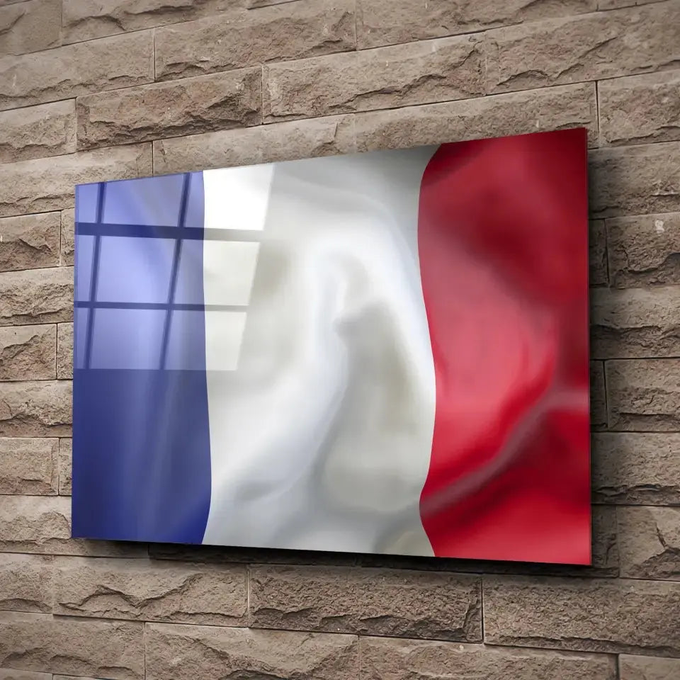 Tableau Drapeau France en verre acrylique, fixé sur un mur de pierre