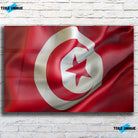 Tableau Drapeau Tunisie en verre acrylique, vue de face sur un mur de briques blanches