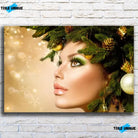 Tableau Femme noël en or sur toile, vue de face sur un mur de briques blanches