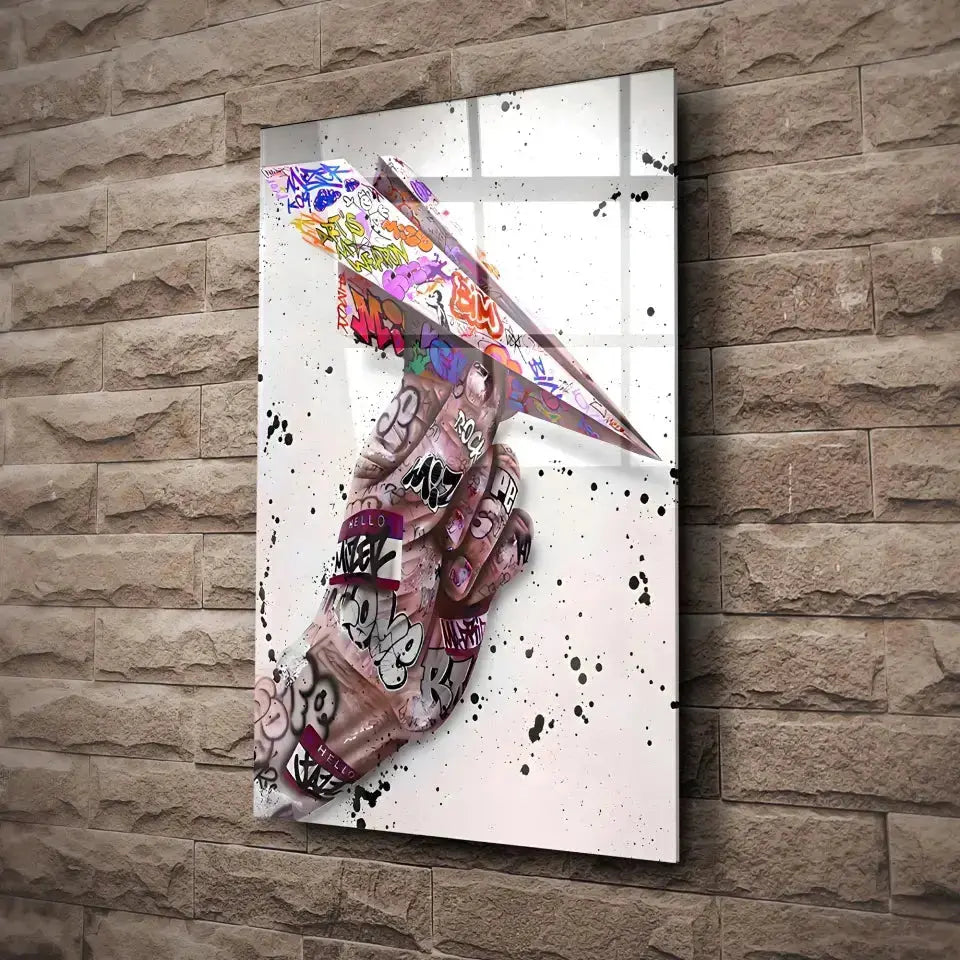 Tableau Street Art Avion en Papier en verre acrylique, fixé sur un mur de pierre