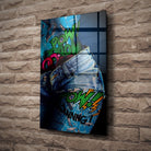 Tableau Street Art Effet Comics et Denim en verre acrylique, fixé sur un mur de pierre