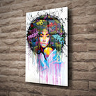 Tableau Street Art Éclat Afro en verre acrylique, fixé sur un mur de pierre