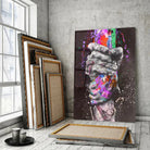 Tableau Street Art Lien Urbain en verre acrylique, posé devant des cadres empilés