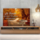 Toile prénoms personnalisée route d'automne posée sur un meuble bas, décoration salon