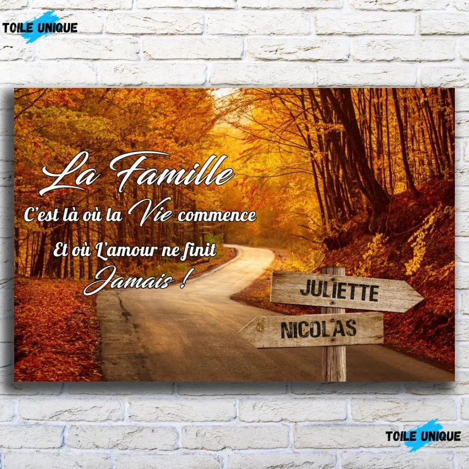 Toile prénoms personnalisée route d'automne sur mur de briques, gros plan