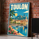 Toile décorative Toulon posée au sol sur un mur de briques