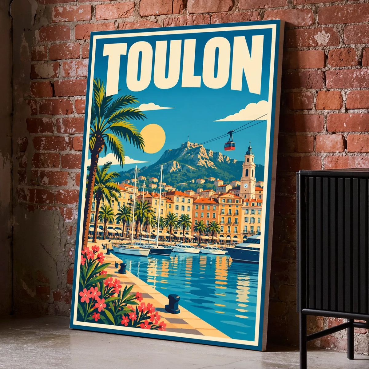 Toile décorative Toulon posée au sol sur un mur de briques